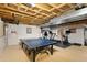 Unfinished basement featuring a ping pong table, and fitness area at 7027 Chestnut Hill St, Highlands Ranch, CO 80130