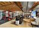 Spacious basement with exercise equipment, and a seating area at 7027 Chestnut Hill St, Highlands Ranch, CO 80130