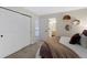 Cozy bedroom with closet and ensuite bathroom access, perfect for relaxation at 7027 Chestnut Hill St, Highlands Ranch, CO 80130