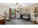 Charming Bedroom room with a cozy crib, decorative wall art, and natural light at 7027 Chestnut Hill St, Highlands Ranch, CO 80130