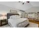 Beautiful bedroom with neutral paint, decor and great natural light from the large window at 7027 Chestnut Hill St, Highlands Ranch, CO 80130