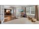 Bright and airy playroom featuring hardwood floors, neutral paint, and lots of natural light at 7027 Chestnut Hill St, Highlands Ranch, CO 80130