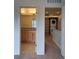 Upstairs hallway showcasing a bathroom vanity and a laundry closet at 8311 Parkland St, Broomfield, CO 80021