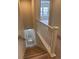 Carpeted staircase with white banister leading to upper level at 8311 Parkland St, Broomfield, CO 80021