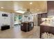 Bright kitchen featuring a stainless range hood, skylight, and wood ceiling at 28251 Shadow Mountain Dr, Conifer, CO 80433