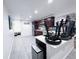 A spacious kitchen with modern appliances, ample counter space, and a clean, organized layout at 9411 Rose Ct, Thornton, CO 80229