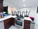 Modern kitchen features stainless steel appliances and sleek countertops at 9411 Rose Ct, Thornton, CO 80229