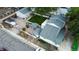 Aerial view of the home showcasing the backyard, detached garage and privacy fence at 195 Briggs St, Erie, CO 80516