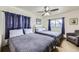 Comfortable bedroom with two beds, a ceiling fan, and a cozy atmosphere at 195 Briggs St, Erie, CO 80516