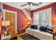 Comfortable bedroom with a ceiling fan, natural light, and a daybed provides space for relaxing at 471 S Grant St, Denver, CO 80209