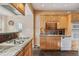 Functional kitchen featuring modern appliances, granite countertops, and ample storage space at 471 S Grant St, Denver, CO 80209