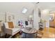 Comfortable sitting area featuring hardwood floors, skylight, and cozy seating at 471 S Grant St, Denver, CO 80209