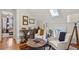 Cozy sitting room featuring hardwood floors, skylight, and comfortable seating at 471 S Grant St, Denver, CO 80209