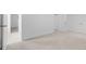 Neutral carpeted bedroom with white walls and white trim at 7068 E Briarwood Dr, Centennial, CO 80112