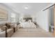 Cozy bedroom featuring a plush bed, stylish furnishings, and a serene ambiance at 7068 E Briarwood Dr, Centennial, CO 80112
