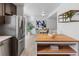 Dining area with a round table, upholstered chairs, and open layout to the kitchen at 7068 E Briarwood Dr, Centennial, CO 80112