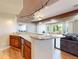 Kitchenette featuring granite counters and custom wood cabinetry, providing ample counter space at 9353 E 146Th Ave, Brighton, CO 80602