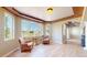 Bright sitting room with natural light, stylish seating, and views of the community at 9353 E 146Th Ave, Brighton, CO 80602