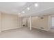 Finished basement area featuring carpet, lighting, and a closet at 10478 W 82Nd Ave, Arvada, CO 80005