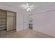 Neutral bedroom with large closet and view of the attached bedroom at 10478 W 82Nd Ave, Arvada, CO 80005