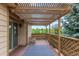 Charming deck with a pergola, offering a peaceful outdoor retreat with natural light and scenic views at 10478 W 82Nd Ave, Arvada, CO 80005