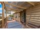 Outdoor deck space with a pergola providing shade, perfect for grilling and relaxing with a view at 10478 W 82Nd Ave, Arvada, CO 80005