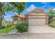 Charming single-Gathering home with a two-car garage, lush lawn, and well-maintained landscaping at 10478 W 82Nd Ave, Arvada, CO 80005