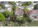 An aerial view captures the home's expansive lot, complemented by a hot tub and a spacious covered deck at 20816 E Shefield Pl, Parker, CO 80138