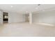 Large basement featuring neutral walls and carpeting, with multiple access doors, ready for your personalization at 20816 E Shefield Pl, Parker, CO 80138
