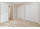 Neutral bedroom with carpet, natural light, and closet space at 20816 E Shefield Pl, Parker, CO 80138