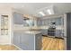Well-equipped kitchen with granite countertops and stainless steel appliances at 20816 E Shefield Pl, Parker, CO 80138