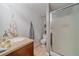 Neutral bathroom with a tile shower, vanity with solid surface, and toilet at 26085 Amy Cir, Conifer, CO 80433