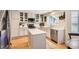 Beautiful kitchen with stainless steel appliances, quartz countertops, and ample cabinet space at 10230 Lauren Ct, Highlands Ranch, CO 80130