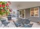 Covered patio with outdoor seating, a ceiling fan, and a barbecue grill at 10230 Lauren Ct, Highlands Ranch, CO 80130