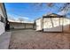 Spacious backyard featuring a covered patio, perfect for outdoor gatherings at 3550 Eudora St, Denver, CO 80207