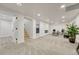 Spacious finished basement with plush carpet, recessed lighting, and a comfortable seating area at 3550 Eudora St, Denver, CO 80207