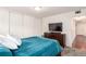 Bright bedroom featuring a large window and plenty of natural light at 12132 Huron St # 203, Denver, CO 80234