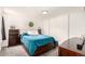 Bedroom with nice furniture and grey carpet at 12132 Huron St # 203, Denver, CO 80234