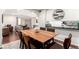 Open concept dining room with seamless access to the living room, perfect for entertaining at 12132 Huron St # 203, Denver, CO 80234