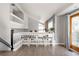 Open concept breakfast bar with seating for four at 6386 S Pierson St, Littleton, CO 80127