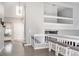 Bright entryway features a skylight, stairs to the second level and an overview of the kitchen at 6386 S Pierson St, Littleton, CO 80127