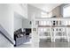Open concept living room with staircase at 6386 S Pierson St, Littleton, CO 80127