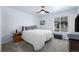 Bedroom with a large window and neutral decor at 4887 Raven Run, Broomfield, CO 80023