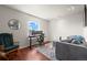Cozy loft area with a comfortable seating and desk area at 4887 Raven Run, Broomfield, CO 80023