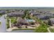 Community pool and clubhouse surrounded by green space and landscaped areas providing a relaxing amenity at 4887 Raven Run, Broomfield, CO 80023