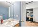 Small bathroom with vanity and a mirror at 1503 S Buckley Way, Aurora, CO 80017