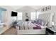 Main bedroom with a large bed and plenty of natural light at 1503 S Buckley Way, Aurora, CO 80017