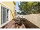 Back deck with patio furniture and white fence at 1503 S Buckley Way, Aurora, CO 80017