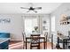 Dining area with a table, chairs, and access to the patio at 1503 S Buckley Way, Aurora, CO 80017
