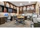 Fully equipped business center with computers, printers, and a conference table for remote work or meetings at 5455 Landmark Pl # 1414, Greenwood Village, CO 80111